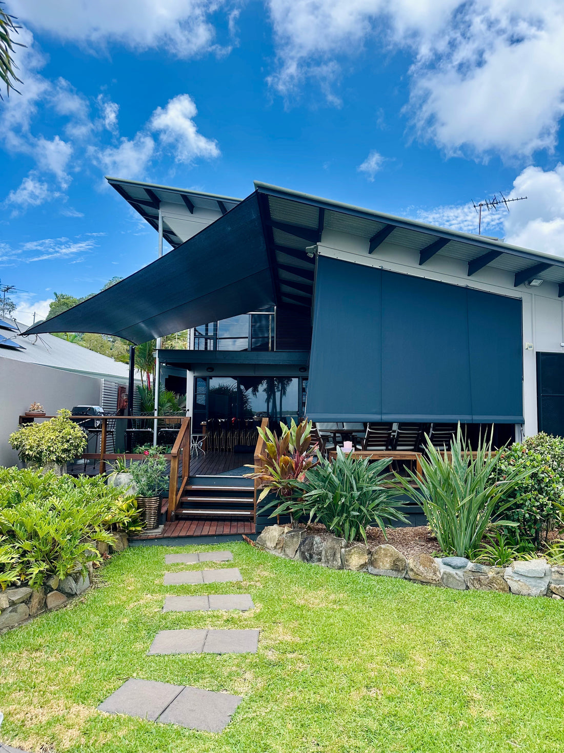 Custom shade sail providing practical shade over an outdoor entertaining area in Mackay QLD